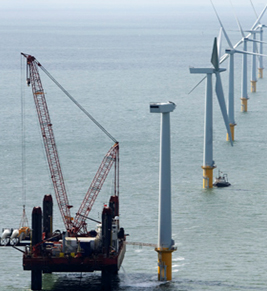 Cranes installing wind turbine. Photo credit: http://www.windenergyplanning.com